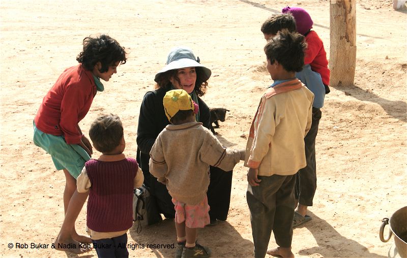 Julie with local children, on the way to Jaisalmer