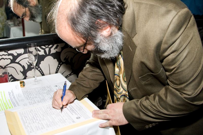Paul Signing at Wedding Contract
